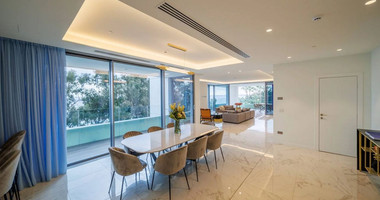 Exclusive Beachfront Living in Agios Tychonas – Four-Bedroom Full-Floor Apartment