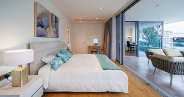 Exclusive Beachfront Living in Agios Tychonas – Four-Bedroom Full-Floor Apartment