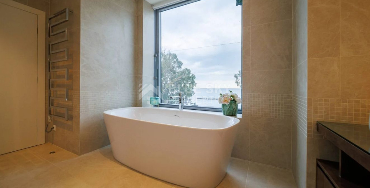 Exclusive Beachfront Living in Agios Tychonas – Four-Bedroom Full-Floor Apartment