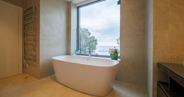 Exclusive Beachfront Living in Agios Tychonas – Four-Bedroom Full-Floor Apartment