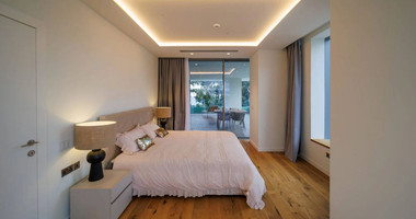 Exclusive Beachfront Living in Agios Tychonas – Four-Bedroom Full-Floor Apartment