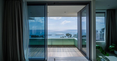 Exclusive Beachfront Living in Agios Tychonas – Four-Bedroom Full-Floor Apartment