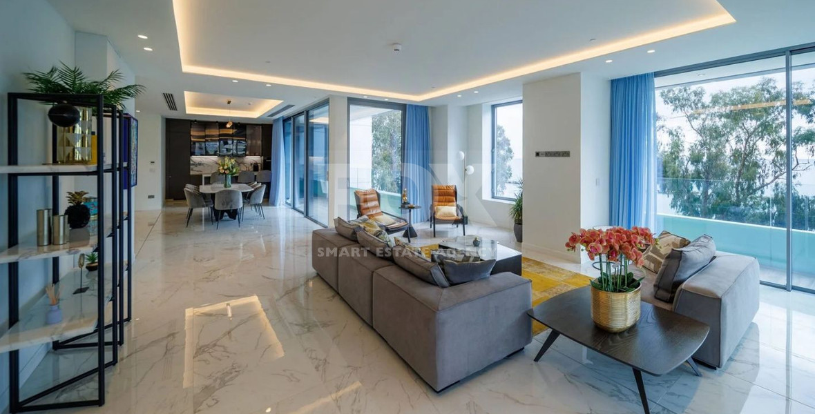 Exclusive Beachfront Living in Agios Tychonas – Four-Bedroom Full-Floor Apartment