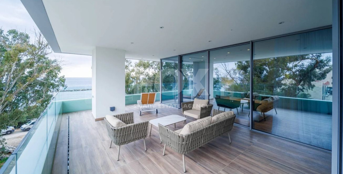 Exclusive Beachfront Living in Agios Tychonas – Four-Bedroom Full-Floor Apartment