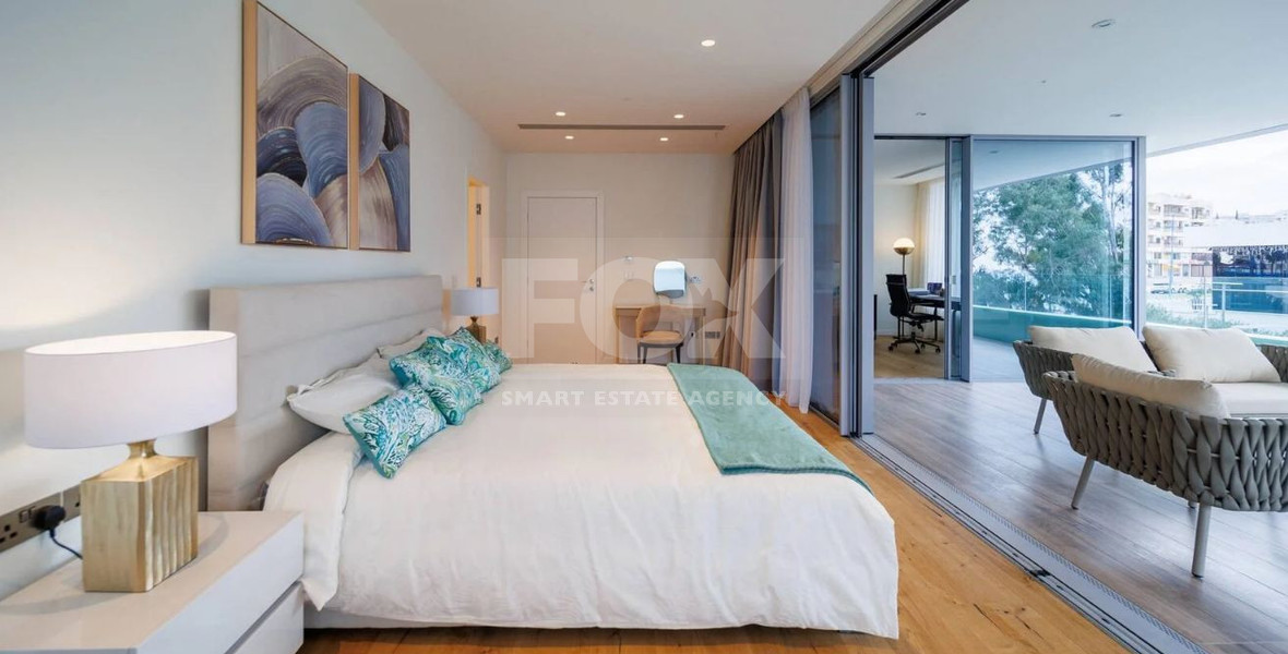 Exclusive Beachfront Living in Agios Tychonas – Four-Bedroom Full-Floor Apartment