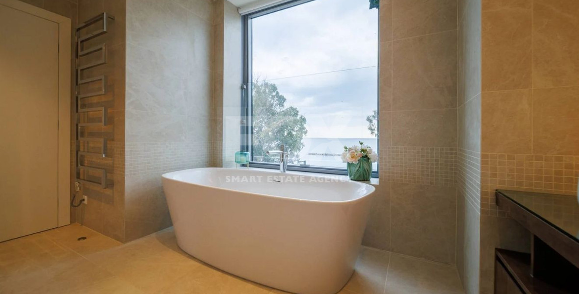 Exclusive Beachfront Living in Agios Tychonas – Four-Bedroom Full-Floor Apartment