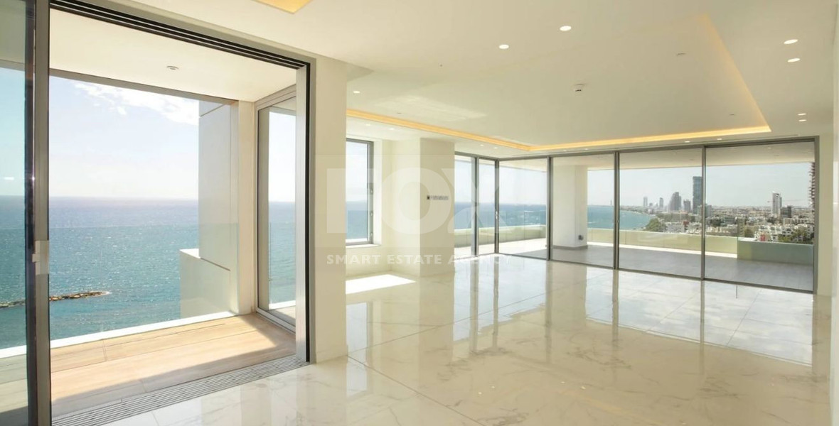 Exclusive Beachfront Living in Agios Tychonas – Four-Bedroom Full-Floor Apartment