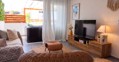 Fully Renovated Two-Bedroom Apartment with Large Veranda & Sea Views for Sale in Peyia