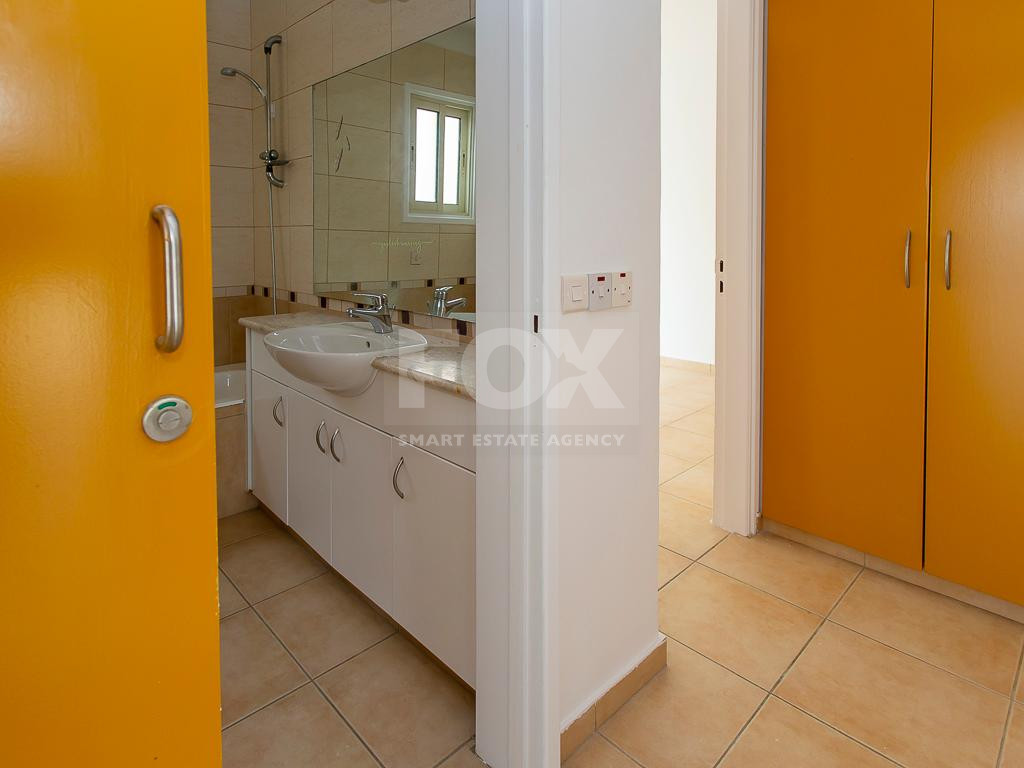 Spacious two Bedroom Apartment with Yard and Parking in Chloraka, Paphos for sale