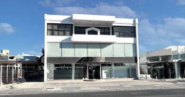 For Rent Commercial Showroom with Mezzanine – Prime Location- easy parking and full visibility.
