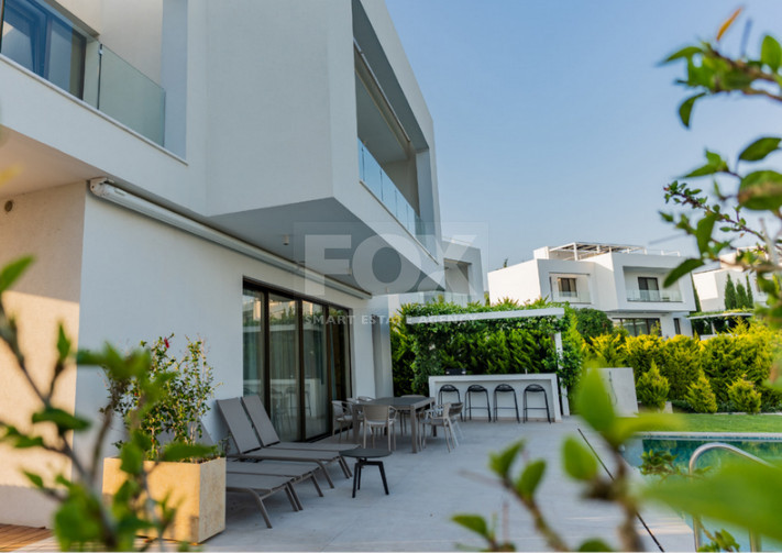 A premium gated four bedroom luxury villa located in the Pegeia , Paphos