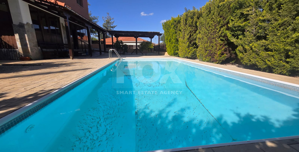 Four bedroom detached house for sale in Louvaras, Cyprus with private swimming pool and fruit garden