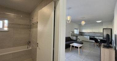 RENT:LARGE BRIGHT ONE BEDROOM GROUND FLOOR APARTMENT IN GERMASOGIA ON ON LARGE PLOT.