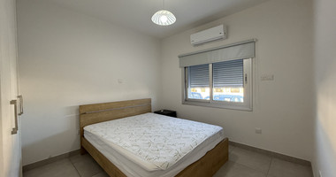 RENT:LARGE BRIGHT ONE BEDROOM GROUND FLOOR APARTMENT IN GERMASOGIA ON ON LARGE PLOT.