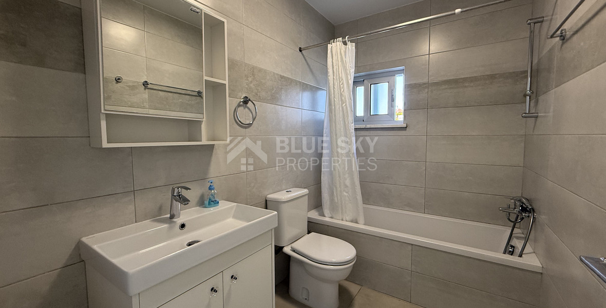 RENT:LARGE BRIGHT ONE BEDROOM GROUND FLOOR APARTMENT IN GERMASOGIA ON ON LARGE PLOT.