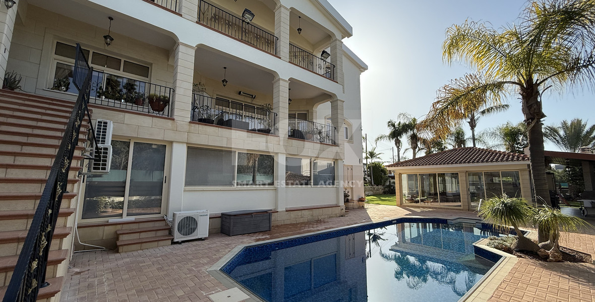 SALE: ELEGANT VILLA IN THE KALOGYRI AREA OF LIMASSOL WITH LARGE GARDENS AND ENTERTAINING AREAS.