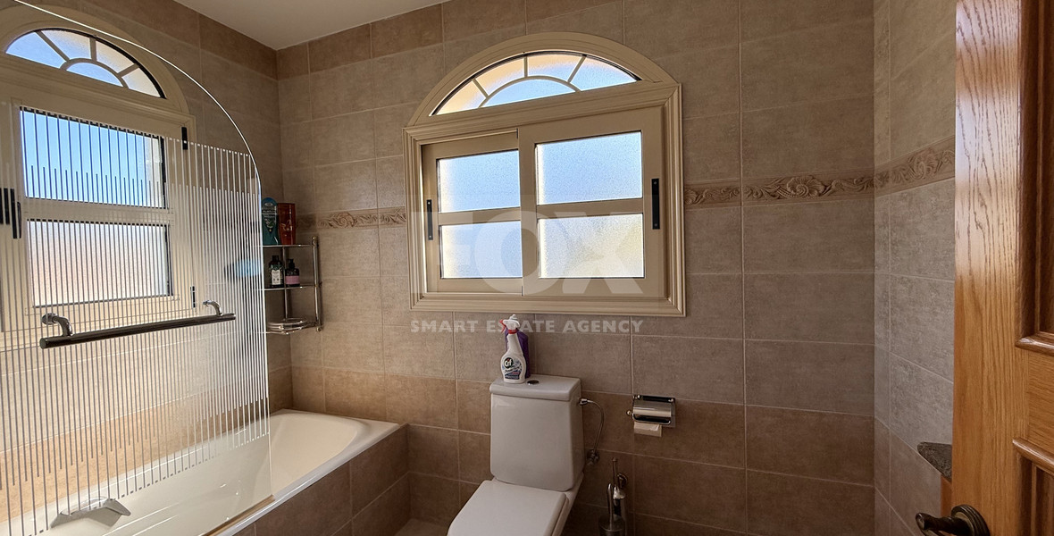 SALE: ELEGANT VILLA IN THE KALOGYRI AREA OF LIMASSOL WITH LARGE GARDENS AND ENTERTAINING AREAS.