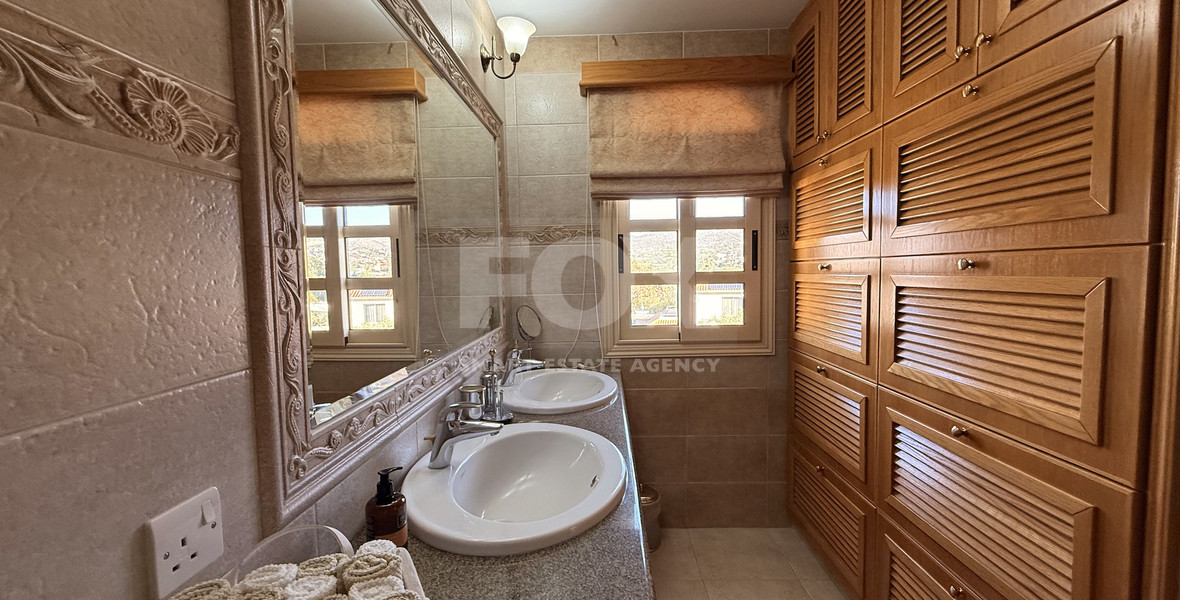SALE: ELEGANT VILLA IN THE KALOGYRI AREA OF LIMASSOL WITH LARGE GARDENS AND ENTERTAINING AREAS.
