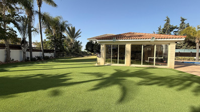 SALE: ELEGANT VILLA IN THE KALOGYRI AREA OF LIMASSOL WITH LARGE GARDENS AND ENTERTAINING AREAS.