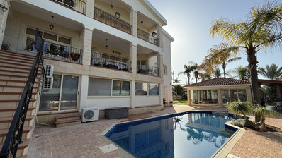 SALE: ELEGANT VILLA IN THE KALOGYRI AREA OF LIMASSOL WITH LARGE GARDENS AND ENTERTAINING AREAS.