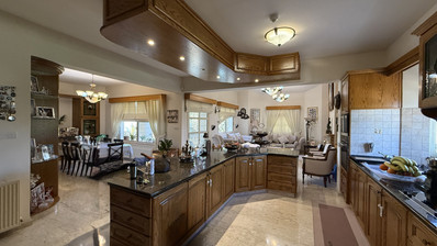 SALE: ELEGANT VILLA IN THE KALOGYRI AREA OF LIMASSOL WITH LARGE GARDENS AND ENTERTAINING AREAS.