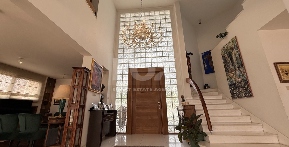 SALE: VILLA FOR SALE IN THE PRESTIGIOUS AREA OF GERMASOGIA OFFERING BEAUTIFUL SEA VIEWS WITH ELECTRIC DRIVE IN ENTRY.