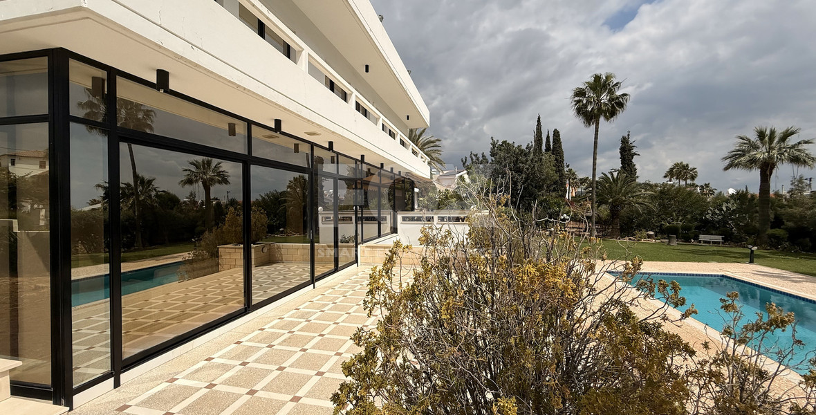 SALE: VILLA FOR SALE IN THE PRESTIGIOUS AREA OF GERMASOGIA OFFERING BEAUTIFUL SEA VIEWS WITH ELECTRIC DRIVE IN ENTRY.