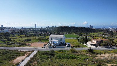 Prime Building Plot in Agia Paraskevi: Panoramic Sea, City & Mountain Views | Ideal for Luxury Villa