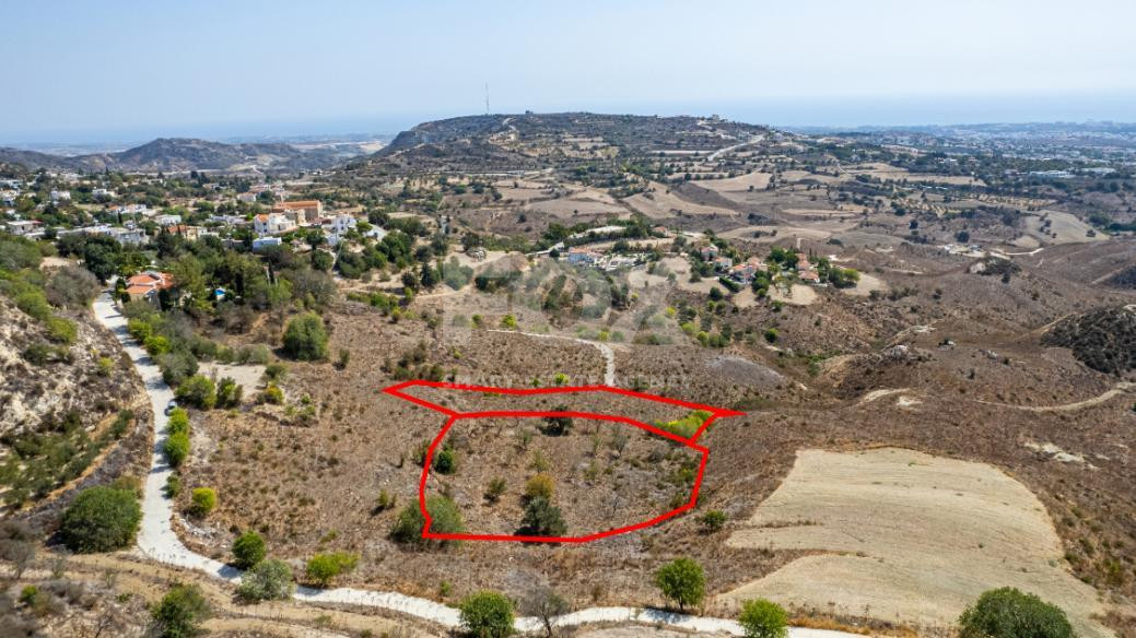 Large Residential Plot in Armou Village – Close to Amenities & Highway