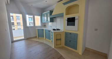 Fully Renovated Two-Bedroom Apartment for Sale in Potamos Germasogeias: Just Steps from the Beach