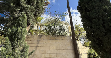 RENT:Deatched 4 bedroom unfurnished house with small garden in Agia Fyla with panoramic sea views,