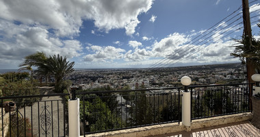 RENT:Deatched 4 bedroom unfurnished house with small garden in Agia Fyla with panoramic sea views,