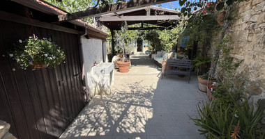 For Sale One-of-a-Kind 5-Bedroom Historic Stone House in the heart of Germasogeia