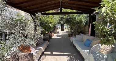 For Sale One-of-a-Kind 5-Bedroom Historic Stone House in the heart of Germasogeia