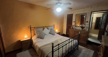 For Sale One-of-a-Kind 5-Bedroom Historic Stone House in the heart of Germasogeia