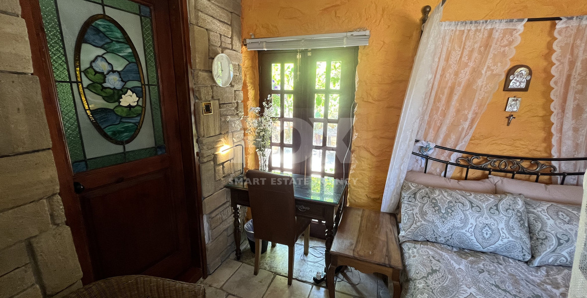For Sale One-of-a-Kind 5-Bedroom Historic Stone House in the heart of Germasogeia