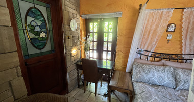 For Sale One-of-a-Kind 5-Bedroom Historic Stone House in the heart of Germasogeia