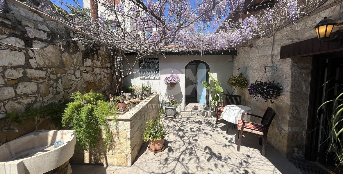 For Sale One-of-a-Kind 5-Bedroom Historic Stone House in the heart of Germasogeia