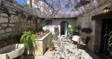 For Sale One-of-a-Kind 5-Bedroom Historic Stone House in the heart of Germasogeia