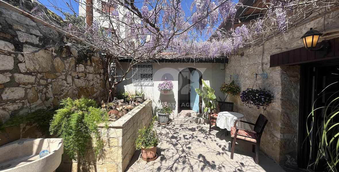 For Sale One-of-a-Kind 5-Bedroom Historic Stone House in the heart of Germasogeia