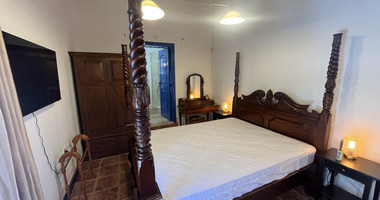 For Sale One-of-a-Kind 5-Bedroom Historic Stone House in the heart of Germasogeia