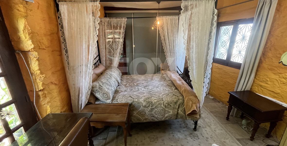 For Sale One-of-a-Kind 5-Bedroom Historic Stone House in the heart of Germasogeia