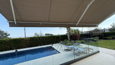 SALE: RESALE VILLA IN SOUNI WITH MATURE LANDSCAPED GARDENS FOR FULL PRIVACY AND SEA VIEWS-EXTERNAL MAIDS QUARTER.