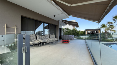SALE: RESALE VILLA IN SOUNI WITH MATURE LANDSCAPED GARDENS FOR FULL PRIVACY AND SEA VIEWS-EXTERNAL MAIDS QUARTER.