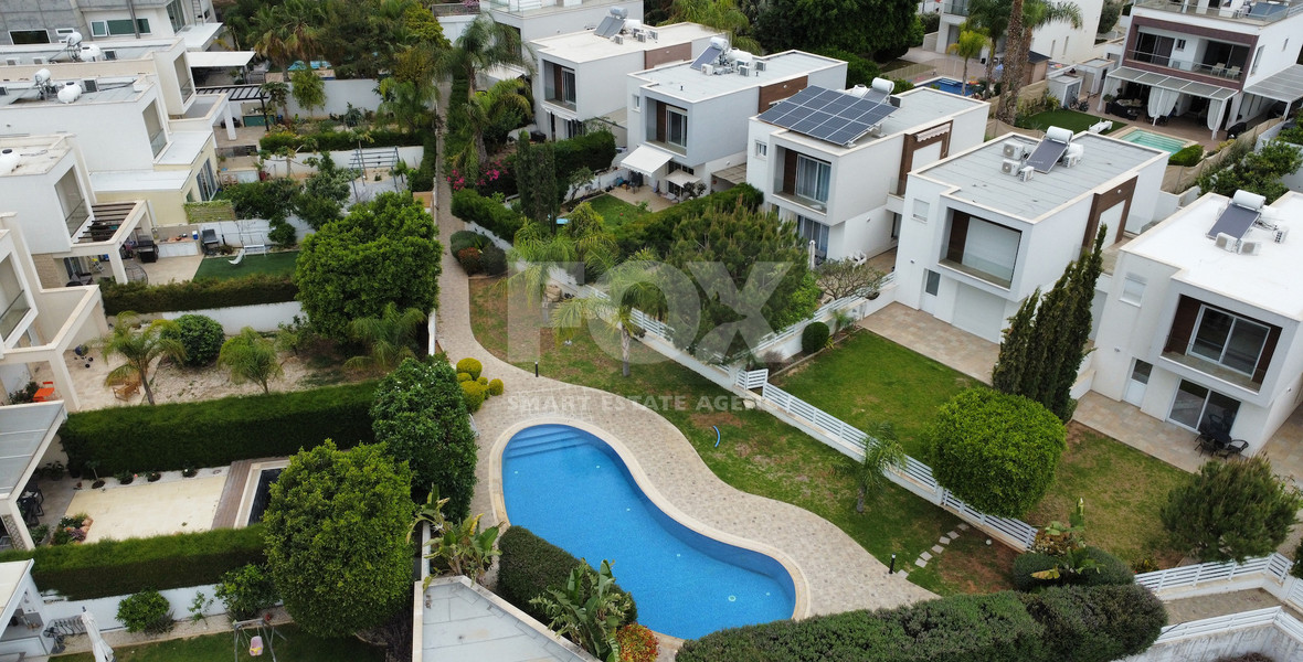 Corner House for Sale in  Mouttagiaka: with Roof Garden in Gated Complex