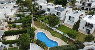 Corner House for Sale in  Mouttagiaka: with Roof Garden in Gated Complex