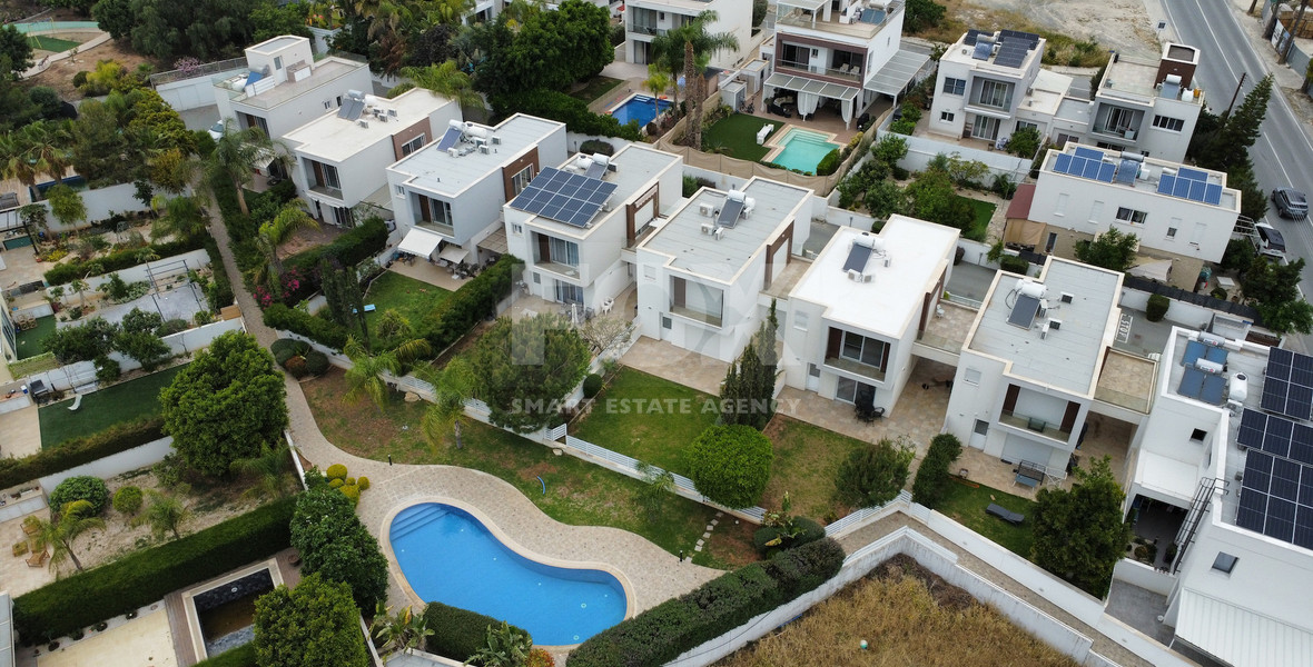 Corner House for Sale in  Mouttagiaka: with Roof Garden in Gated Complex