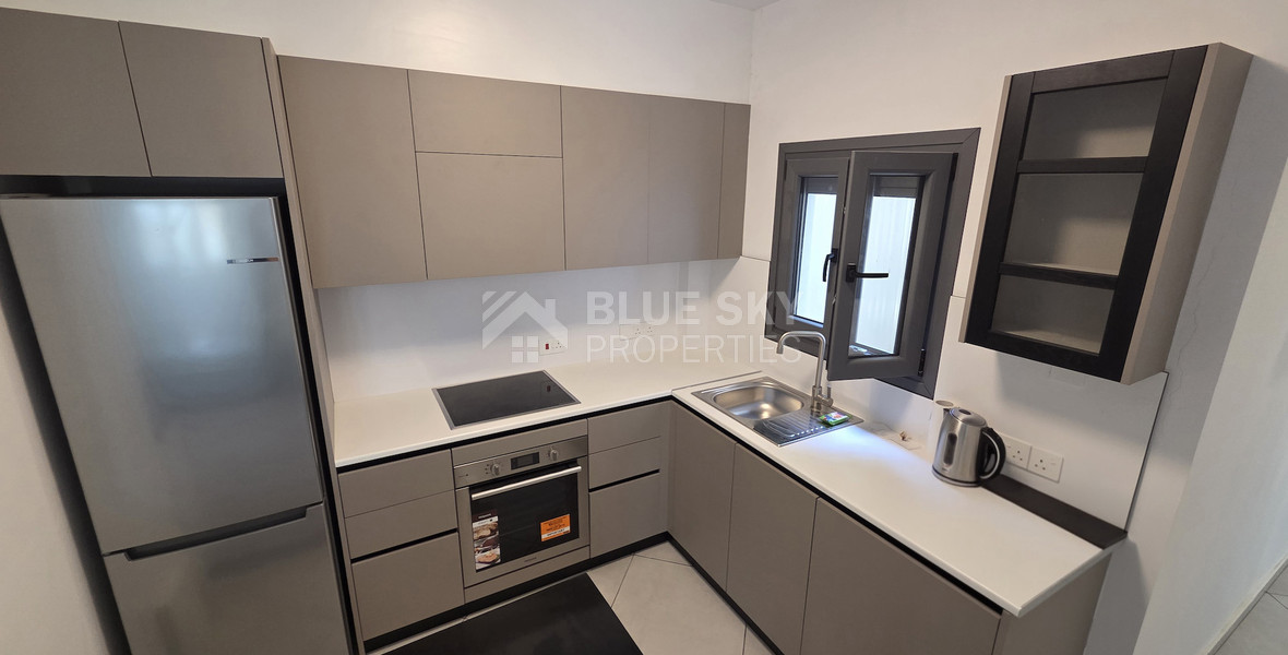 Just 300 meters from the sea, Newly renovated, spacious Two-bedroom apartment with a private garden, Neapoli, Limassol – the perfect home in a prestigious location.
