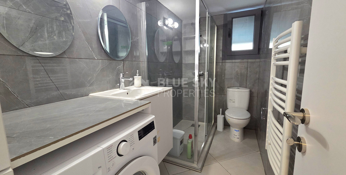 Just 300 meters from the sea, Newly renovated, spacious Two-bedroom apartment with a private garden, Neapoli, Limassol – the perfect home in a prestigious location.