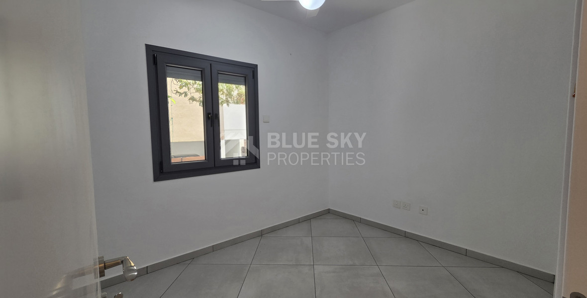 Just 300 meters from the sea, Newly renovated, spacious Two-bedroom apartment with a private garden, Neapoli, Limassol – the perfect home in a prestigious location.